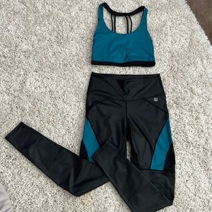 Like new born primitive workout set. Teal and black set.